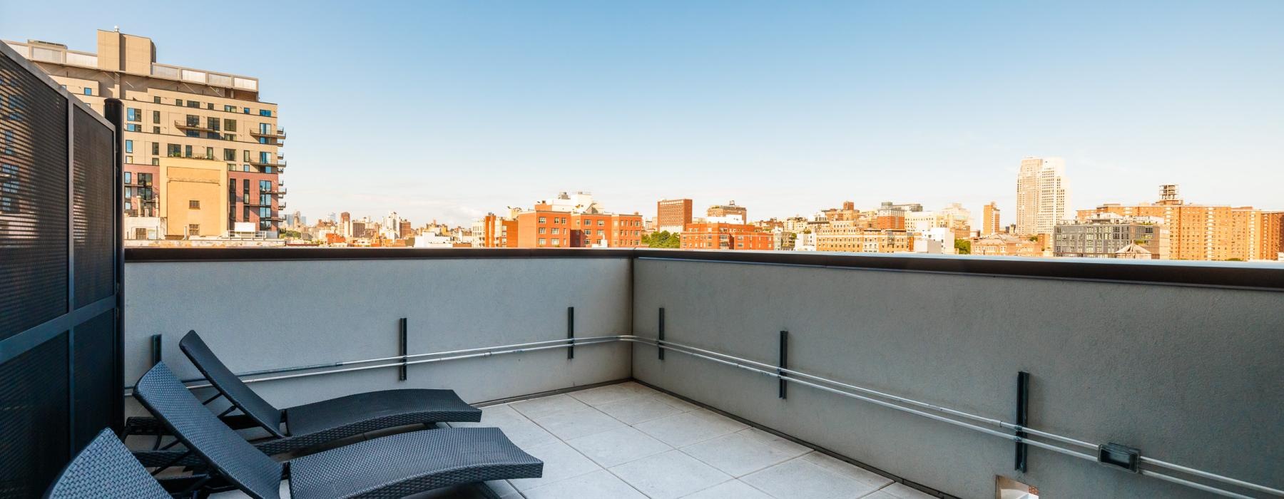 a deck overlooking a city